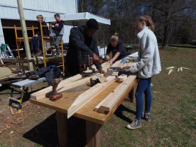 Students putting together the roof truss